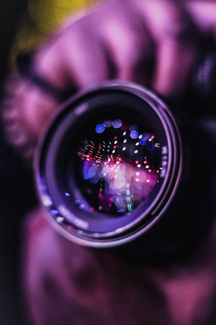 Vibrant reflections in a camera lens; an artistic photography close-up.